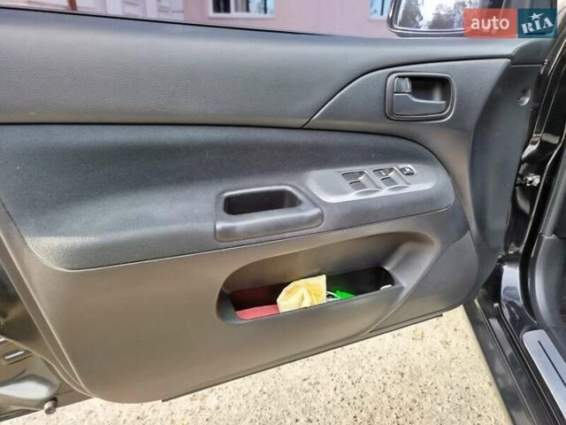 Черный Мицубиси Лансер, объемом двигателя 1.58 л и пробегом 78 тыс. км за 6500 $, фото 23 на Automoto.ua