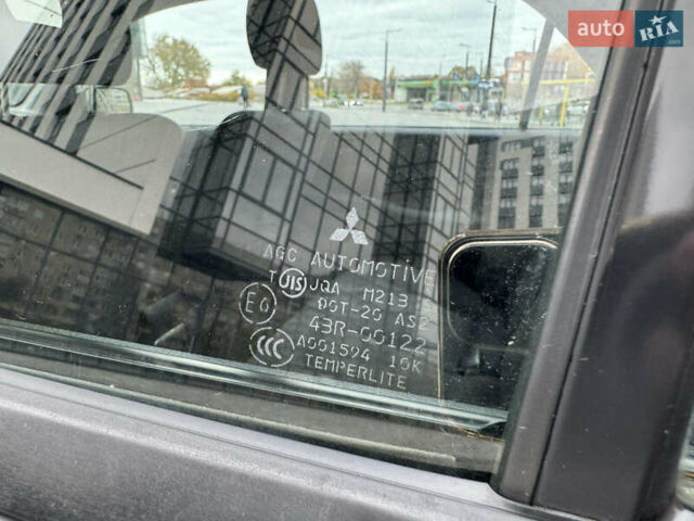 Чорний Міцубісі Lancer, об'ємом двигуна 1.58 л та пробігом 128 тис. км за 5999 $, фото 29 на Automoto.ua