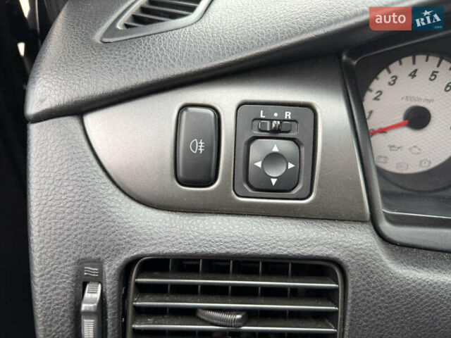 Чорний Міцубісі Lancer, об'ємом двигуна 1.58 л та пробігом 128 тис. км за 5999 $, фото 11 на Automoto.ua