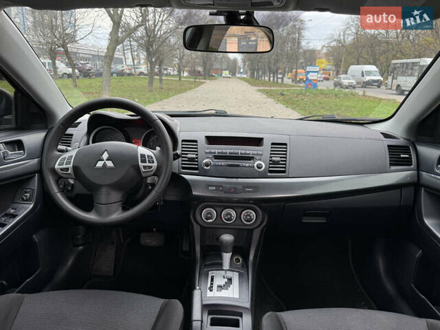 Черный Мицубиси Лансер, объемом двигателя 2 л и пробегом 221 тыс. км за 6750 $, фото 41 на Automoto.ua
