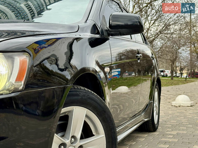 Черный Мицубиси Лансер, объемом двигателя 2 л и пробегом 221 тыс. км за 6750 $, фото 7 на Automoto.ua