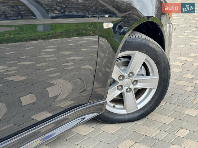 Черный Мицубиси Лансер, объемом двигателя 2 л и пробегом 221 тыс. км за 6750 $, фото 23 на Automoto.ua