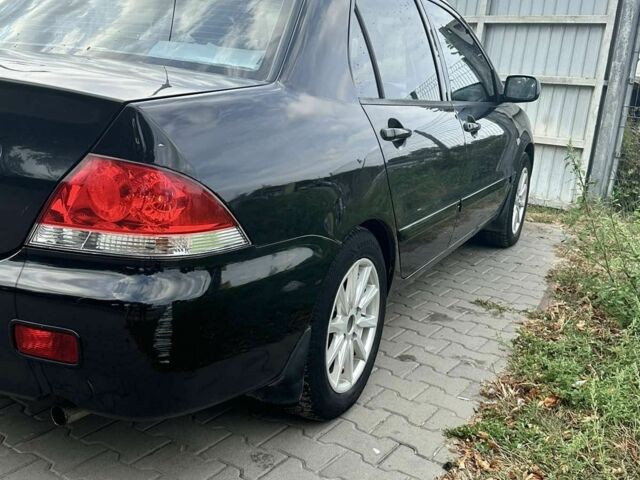 Чорний Міцубісі Lancer, об'ємом двигуна 0 л та пробігом 220 тис. км за 3000 $, фото 2 на Automoto.ua