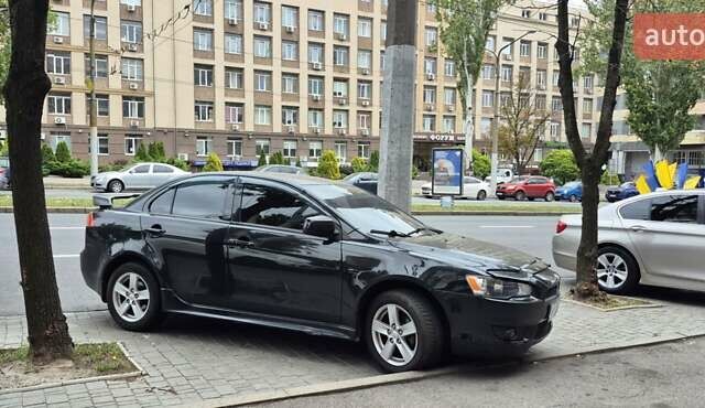 Чорний Міцубісі Lancer, об'ємом двигуна 2 л та пробігом 230 тис. км за 6800 $, фото 1 на Automoto.ua