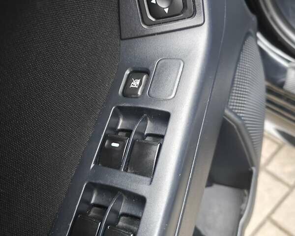 Черный Мицубиси Лансер, объемом двигателя 2 л и пробегом 228 тыс. км за 7000 $, фото 6 на Automoto.ua