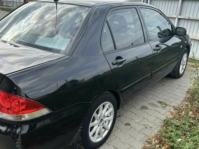 Чорний Міцубісі Lancer, об'ємом двигуна 0 л та пробігом 220 тис. км за 3000 $, фото 4 на Automoto.ua
