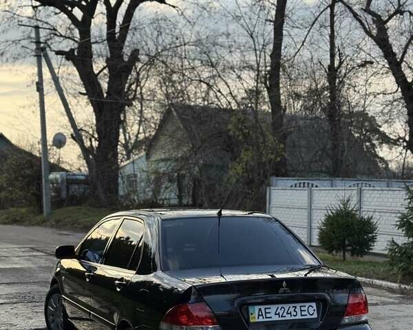 Чорний Міцубісі Lancer, об'ємом двигуна 1.6 л та пробігом 98 тис. км за 5600 $, фото 1 на Automoto.ua