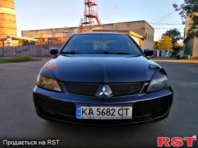 Чорний Міцубісі Lancer, об'ємом двигуна 1.6 л та пробігом 296 тис. км за 3650 $, фото 7 на Automoto.ua