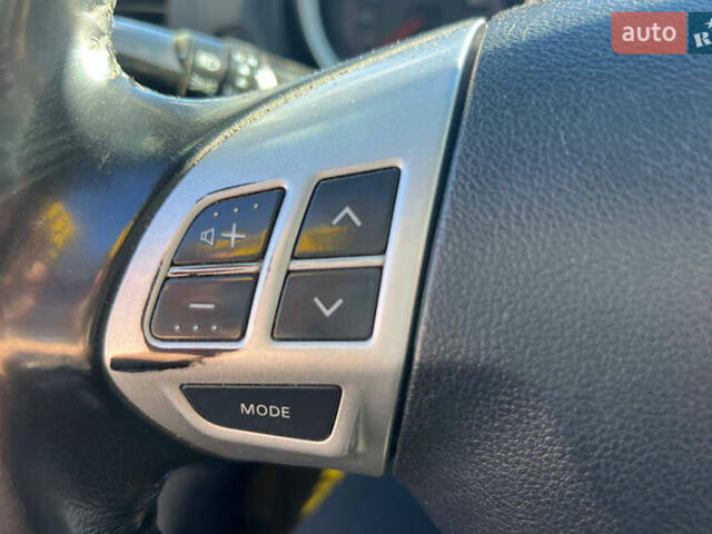 Черный Мицубиси Лансер, объемом двигателя 2 л и пробегом 215 тыс. км за 7000 $, фото 9 на Automoto.ua