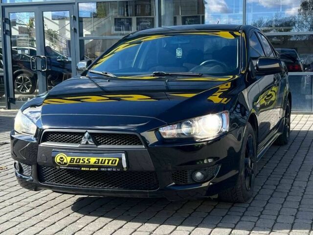 Черный Мицубиси Лансер, объемом двигателя 2 л и пробегом 215 тыс. км за 7000 $, фото 2 на Automoto.ua