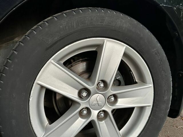 Чорний Міцубісі Lancer, об'ємом двигуна 2 л та пробігом 253 тис. км за 7300 $, фото 6 на Automoto.ua