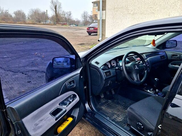 Чорний Міцубісі Lancer, об'ємом двигуна 1.6 л та пробігом 300 тис. км за 3500 $, фото 8 на Automoto.ua