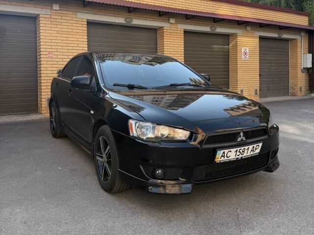Чорний Міцубісі Lancer, об'ємом двигуна 2 л та пробігом 209 тис. км за 7600 $, фото 3 на Automoto.ua