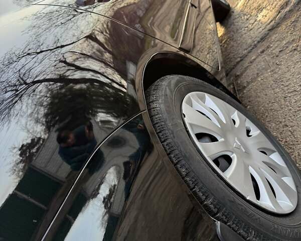 Чорний Міцубісі Lancer, об'ємом двигуна 1.6 л та пробігом 98 тис. км за 5600 $, фото 15 на Automoto.ua