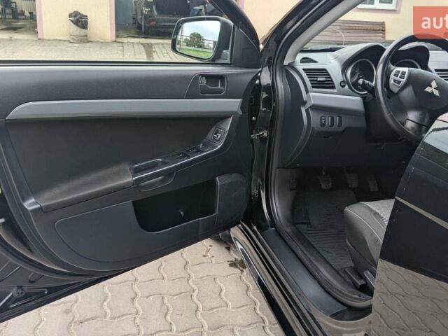 Чорний Міцубісі Lancer, об'ємом двигуна 1.5 л та пробігом 142 тис. км за 7800 $, фото 4 на Automoto.ua