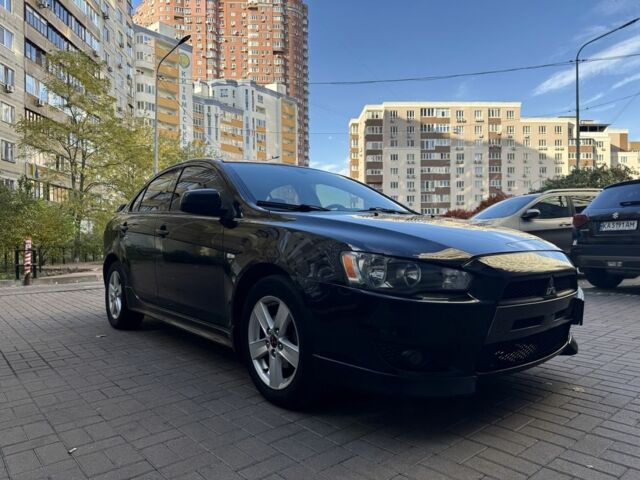 Мицубиси Лансер 2010 в Киеве на Automoto.ua Черный Мицубиси Лансер, объемом двигателя 2 л и пробегом 189 тыс. км за 5700 $, фото 4 на Automoto.ua