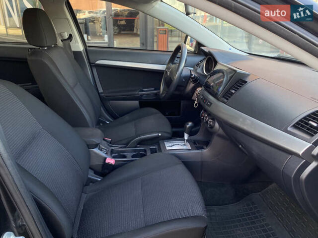 Чорний Міцубісі Lancer, об'ємом двигуна 1.5 л та пробігом 203 тис. км за 6250 $, фото 21 на Automoto.ua