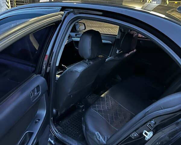 Чорний Міцубісі Lancer, об'ємом двигуна 1.5 л та пробігом 182 тис. км за 7400 $, фото 8 на Automoto.ua