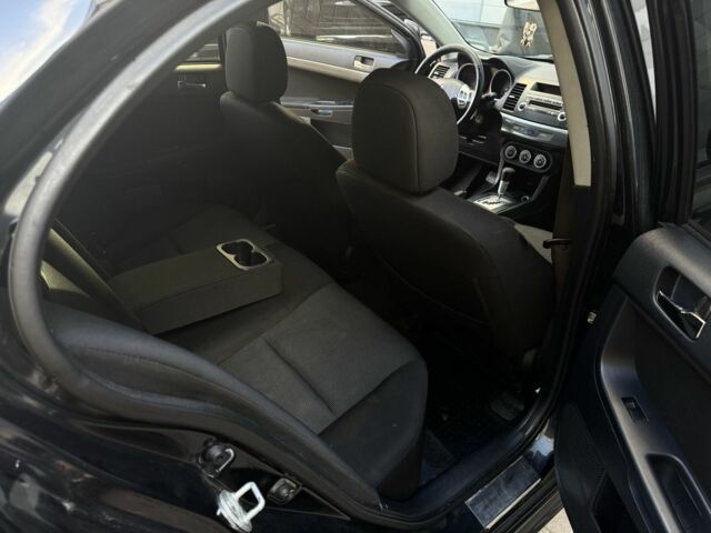 Мицубиси Лансер 2010 в Киеве на Automoto.ua Черный Мицубиси Лансер, объемом двигателя 2 л и пробегом 189 тыс. км за 5700 $, фото 21 на Automoto.ua