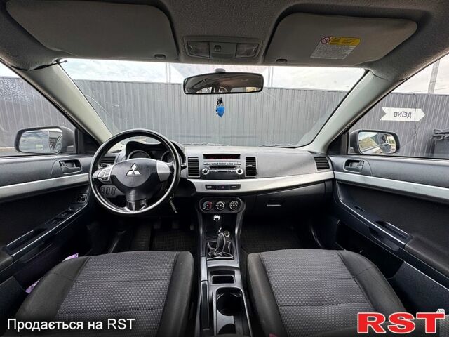 Черный Мицубиси Лансер, объемом двигателя 1.5 л и пробегом 214 тыс. км за 5799 $, фото 3 на Automoto.ua