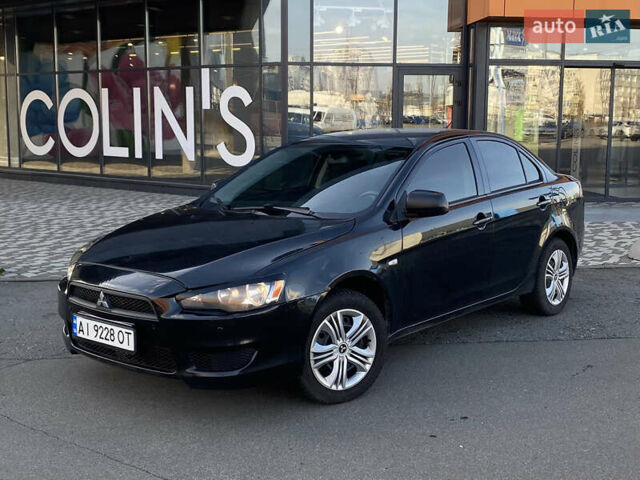 Черный Мицубиси Лансер, объемом двигателя 1.5 л и пробегом 203 тыс. км за 5990 $, фото 3 на Automoto.ua