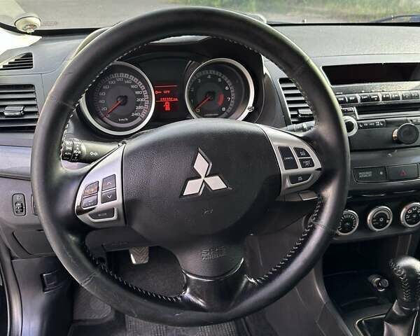 Чорний Міцубісі Lancer, об'ємом двигуна 2 л та пробігом 292 тис. км за 7500 $, фото 12 на Automoto.ua