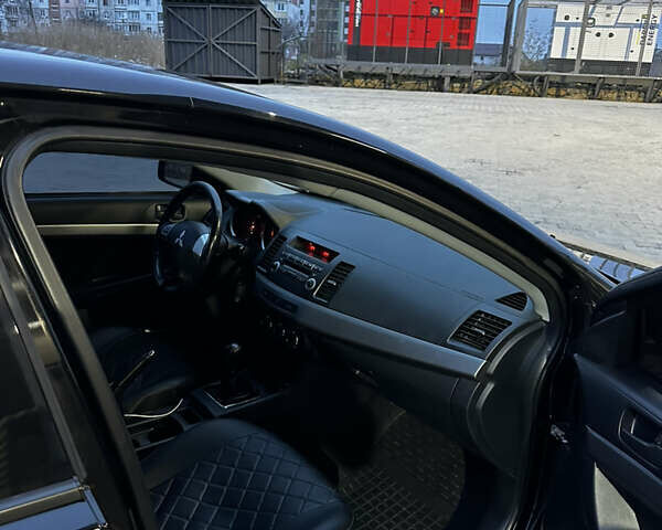 Чорний Міцубісі Lancer, об'ємом двигуна 1.5 л та пробігом 182 тис. км за 7400 $, фото 9 на Automoto.ua
