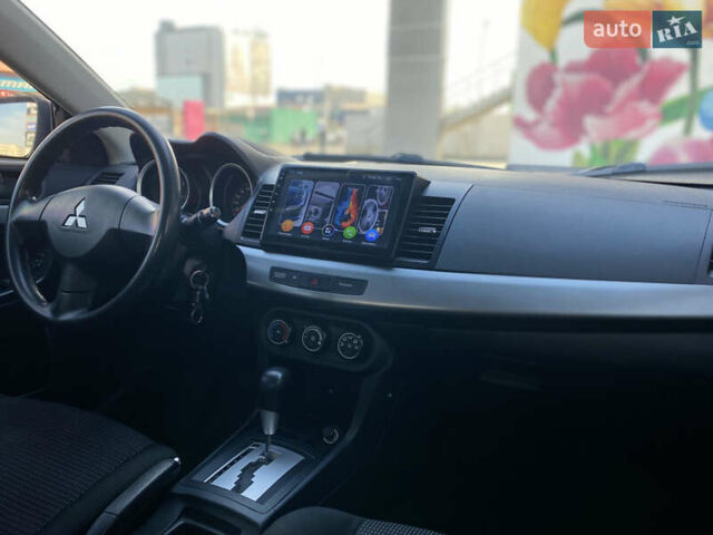 Чорний Міцубісі Lancer, об'ємом двигуна 1.5 л та пробігом 203 тис. км за 6250 $, фото 11 на Automoto.ua