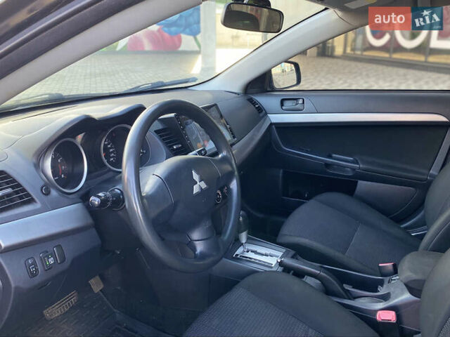 Чорний Міцубісі Lancer, об'ємом двигуна 1.5 л та пробігом 203 тис. км за 6250 $, фото 16 на Automoto.ua