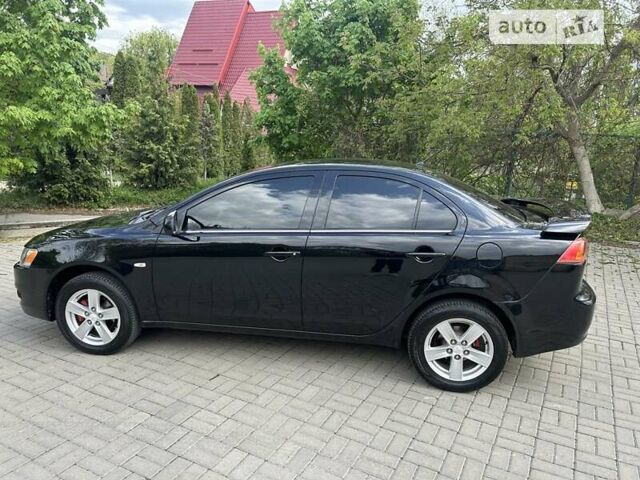 Чорний Міцубісі Lancer, об'ємом двигуна 1.5 л та пробігом 205 тис. км за 5850 $, фото 18 на Automoto.ua