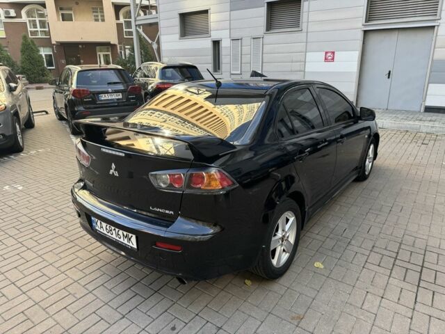 Мицубиси Лансер 2010 в Киеве на Automoto.ua Черный Мицубиси Лансер, объемом двигателя 2 л и пробегом 189 тыс. км за 5700 $, фото 6 на Automoto.ua