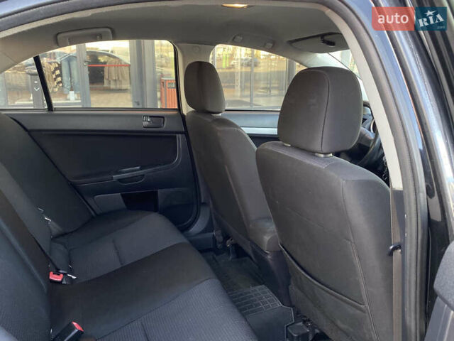 Чорний Міцубісі Lancer, об'ємом двигуна 1.5 л та пробігом 203 тис. км за 6250 $, фото 25 на Automoto.ua