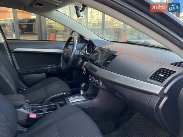 Черный Мицубиси Лансер, объемом двигателя 1.5 л и пробегом 203 тыс. км за 5990 $, фото 21 на Automoto.ua