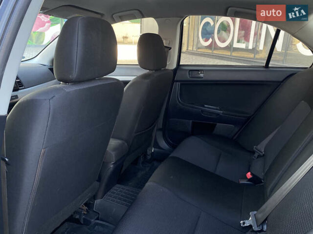 Чорний Міцубісі Lancer, об'ємом двигуна 1.5 л та пробігом 203 тис. км за 6250 $, фото 22 на Automoto.ua