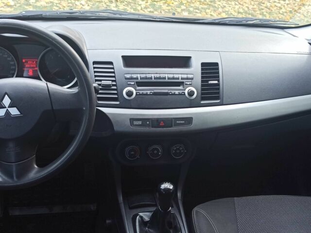 Черный Мицубиси Лансер, объемом двигателя 1.5 л и пробегом 261 тыс. км за 7500 $, фото 8 на Automoto.ua