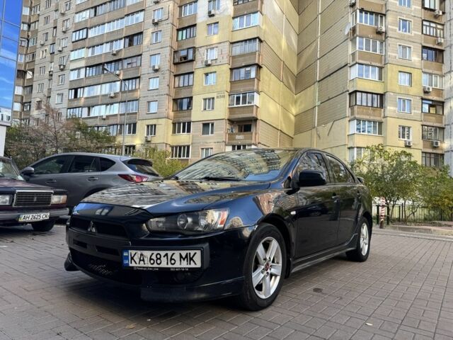 Мицубиси Лансер 2010 в Киеве на Automoto.ua Черный Мицубиси Лансер, объемом двигателя 2 л и пробегом 189 тыс. км за 5700 $, фото 14 на Automoto.ua