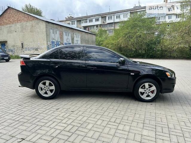 Чорний Міцубісі Lancer, об'ємом двигуна 1.5 л та пробігом 205 тис. км за 5850 $, фото 13 на Automoto.ua