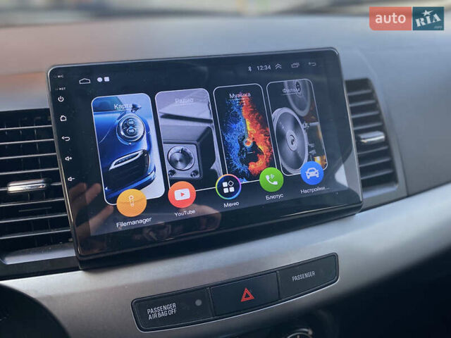 Чорний Міцубісі Lancer, об'ємом двигуна 1.5 л та пробігом 203 тис. км за 6250 $, фото 13 на Automoto.ua