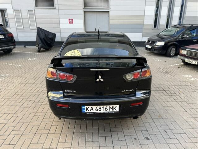 Мицубиси Лансер 2010 в Киеве на Automoto.ua Черный Мицубиси Лансер, объемом двигателя 2 л и пробегом 189 тыс. км за 5700 $, фото 8 на Automoto.ua