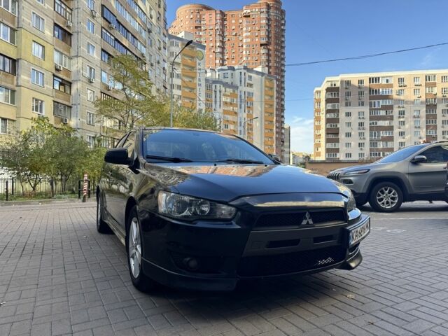 Мицубиси Лансер 2010 в Киеве на Automoto.ua Черный Мицубиси Лансер, объемом двигателя 2 л и пробегом 189 тыс. км за 5700 $, фото 15 на Automoto.ua