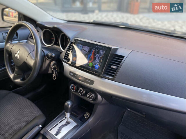 Чорний Міцубісі Lancer, об'ємом двигуна 1.5 л та пробігом 203 тис. км за 6250 $, фото 12 на Automoto.ua