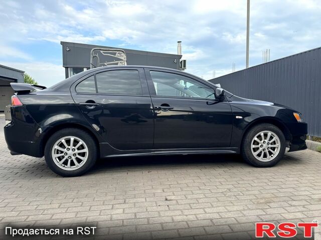 Черный Мицубиси Лансер, объемом двигателя 1.5 л и пробегом 214 тыс. км за 5799 $, фото 4 на Automoto.ua