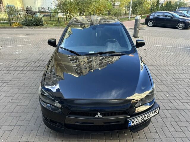 Мицубиси Лансер 2010 в Киеве на Automoto.ua Черный Мицубиси Лансер, объемом двигателя 2 л и пробегом 189 тыс. км за 5700 $, фото 2 на Automoto.ua