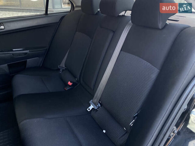 Чорний Міцубісі Lancer, об'ємом двигуна 1.5 л та пробігом 203 тис. км за 6250 $, фото 23 на Automoto.ua