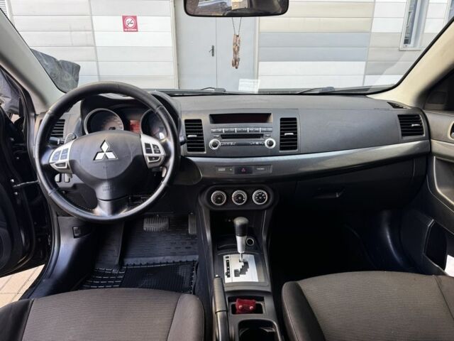 Мицубиси Лансер 2010 в Киеве на Automoto.ua Черный Мицубиси Лансер, объемом двигателя 2 л и пробегом 189 тыс. км за 5700 $, фото 20 на Automoto.ua