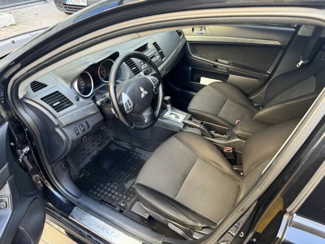 Мицубиси Лансер 2010 в Киеве на Automoto.ua Черный Мицубиси Лансер, объемом двигателя 2 л и пробегом 189 тыс. км за 5700 $, фото 17 на Automoto.ua