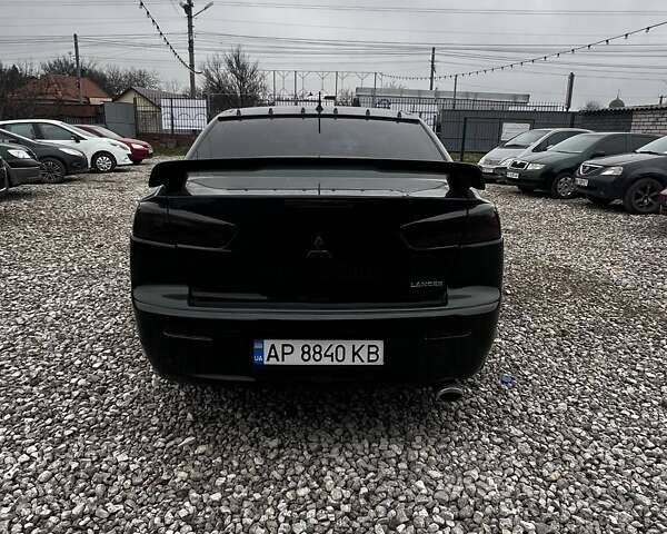 Черный Мицубиси Лансер, объемом двигателя 1.5 л и пробегом 250 тыс. км за 4800 $, фото 7 на Automoto.ua