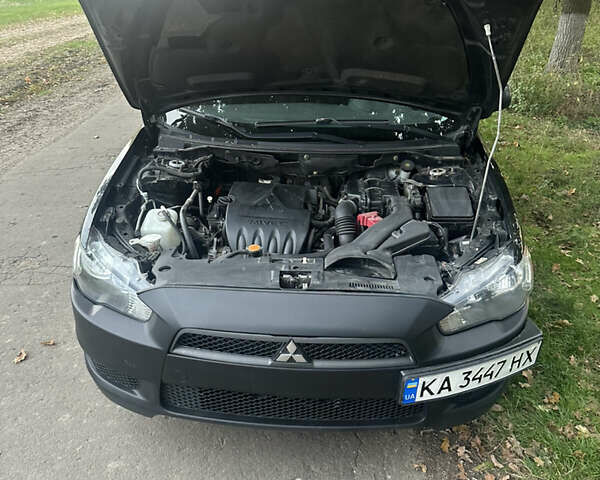 Черный Мицубиси Лансер, объемом двигателя 1.5 л и пробегом 202 тыс. км за 6500 $, фото 42 на Automoto.ua