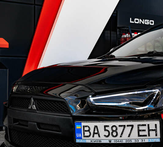 Чорний Міцубісі Lancer, об'ємом двигуна 2 л та пробігом 204 тис. км за 9500 $, фото 53 на Automoto.ua