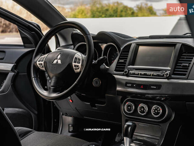 Чорний Міцубісі Lancer, об'ємом двигуна 2 л та пробігом 204 тис. км за 9500 $, фото 30 на Automoto.ua